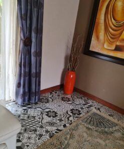 Beulah Presidential Suite luxury bedroom with king-size bed and elegant lighting at Quereba Bed and Breakfast Mafikeng.