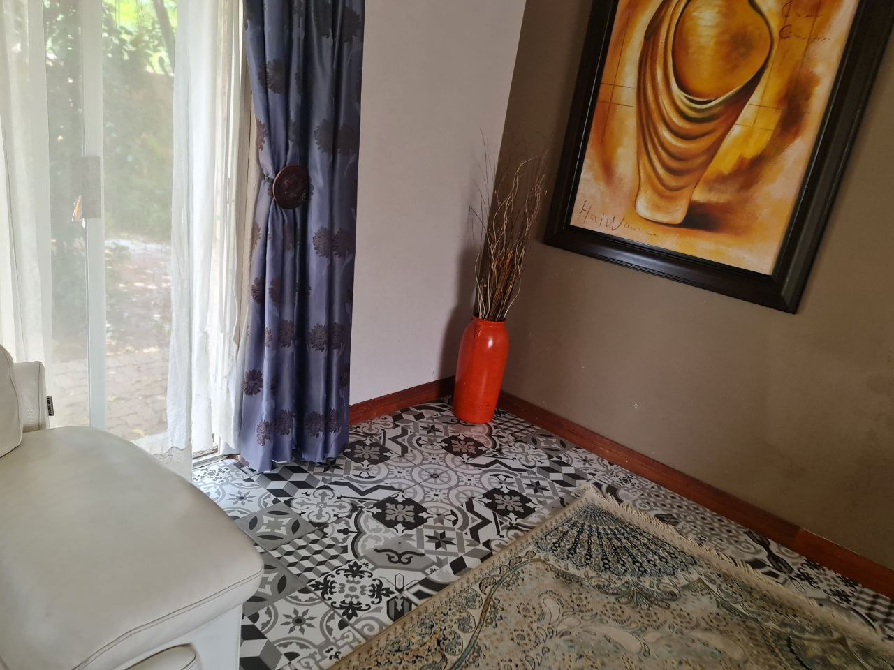 Beulah Presidential Suite luxury bedroom with king-size bed and elegant lighting at Quereba Bed and Breakfast Mafikeng.